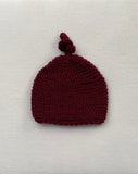 Knitted by Nana Top Knot Beanie - Sangria