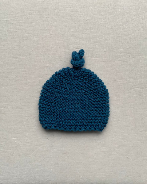 Knitted by Nana Top Knot Beanie - Coastal Blue
