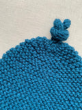 Knitted by Nana Top Knot Beanie - Coastal Blue