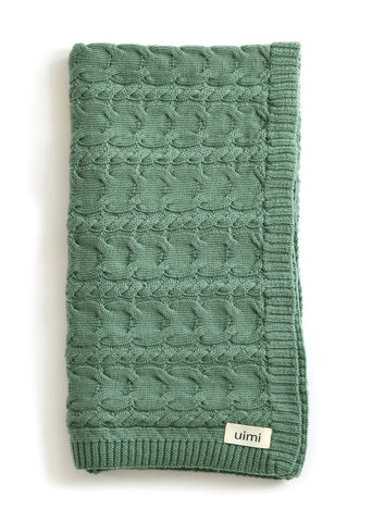 Uimi Valentina Cable Merino Blanket. Size: Bassinet. Colour: Jade