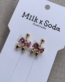 Milk X Soda Crystal Ribbon Earrings - Pink