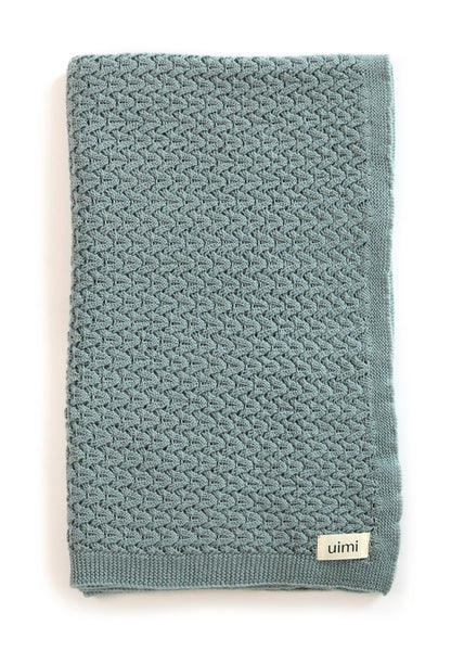 Uimi Ruby Crochet Stitch Merino Blanket. Size: Cot. Colour: Sea