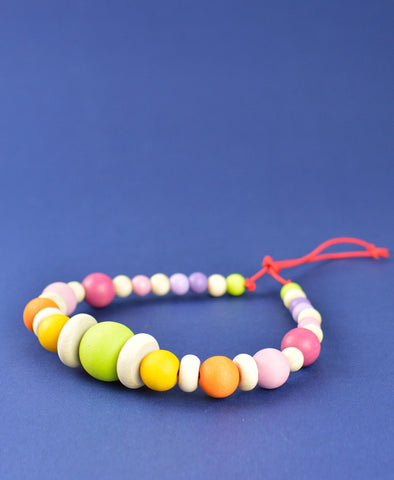 Grimm's Pram String- Pink/Orange